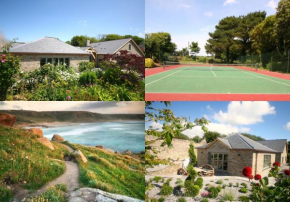 Putsborough Manor 3 Self Catering Cottages with Beach a short walk dog friendly all year, On site Tennis, Play Area, Paddock, Spa baths, BBQ, Private Gardens, Superfast WIFI